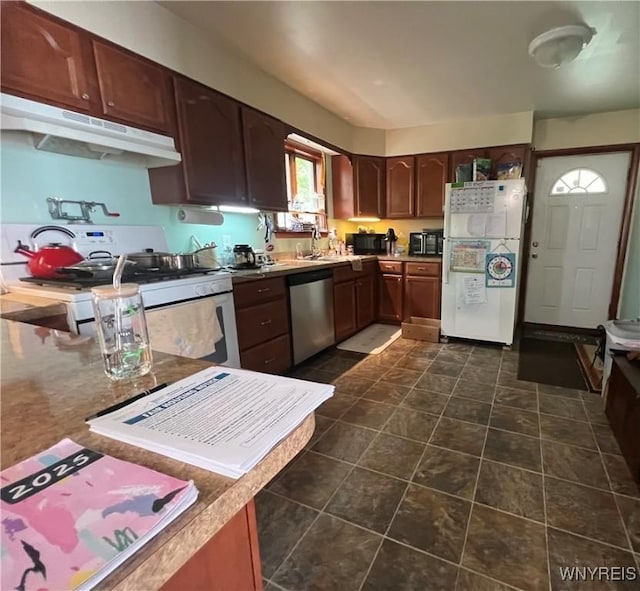 272 Dewitt St, Buffalo, NY 14213 - kitchen featuring white appliances, under cabinet range hood, a sink, dark tile patterned floors, and dark brown cabinets
