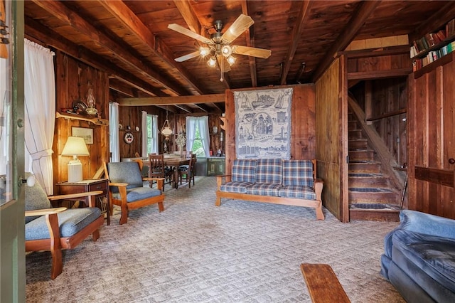 7732 Lake Blf, Huron, NY 14590 - carpeted living area with wood walls, a ceiling fan, wood ceiling, and stairs