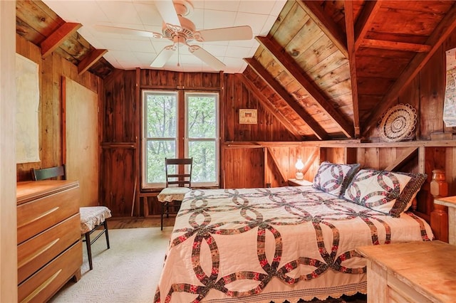 7732 Lake Blf, Huron, NY 14590 - carpeted bedroom with wooden walls and vaulted ceiling