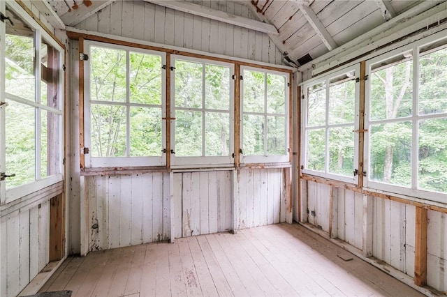 7732 Lake Blf, Huron, NY 14590 - unfurnished sunroom featuring lofted ceiling and french doors