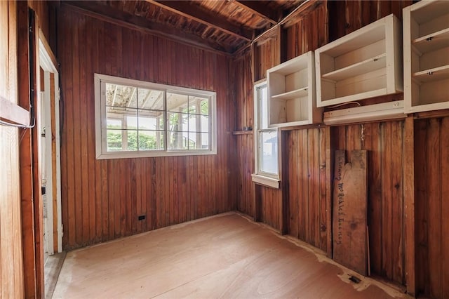 7732 Lake Blf, Huron, NY 14590 - unfurnished room featuring wood finished floors and wooden walls