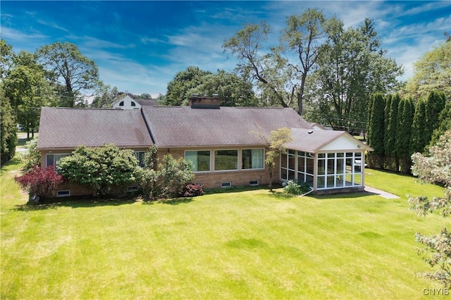 139 Capitol Street Ext, Sennett, NY 13021 - back of house featuring a sunroom, a lawn, crawl space, and a chimney