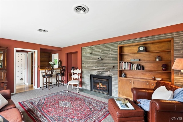 139 Capitol Street Ext, Sennett, NY 13021 - living room featuring carpet and a fireplace with flush hearth