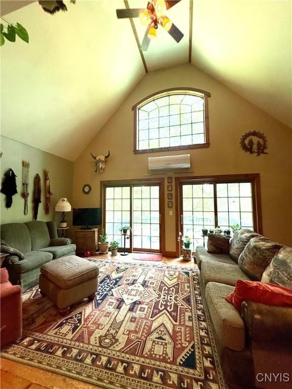 3805 State Highway 80, Columbus, NY 13460 - living room featuring a ceiling fan, a wall mounted air conditioner, and high vaulted ceiling