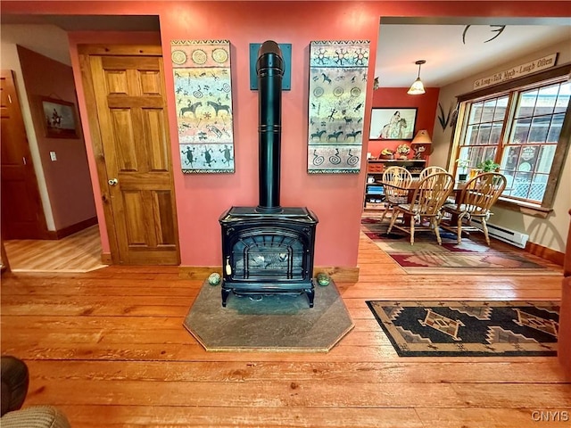 3805 State Highway 80, Columbus, NY 13460 - detailed view of wood finished floors and a wood stove