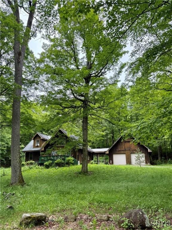 3805 State Highway 80, Columbus, NY 13460 - view of yard featuring a garage