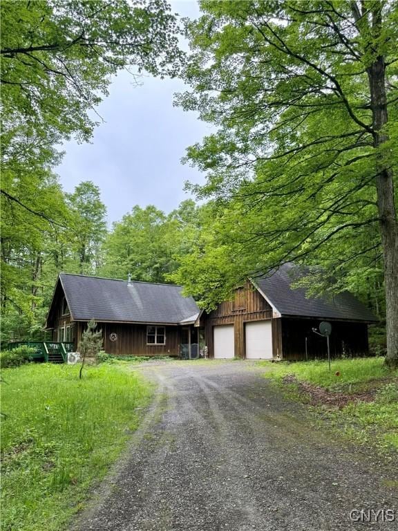 3805 State Highway 80, Columbus, NY 13460 - ranch-style house with dirt driveway and a garage