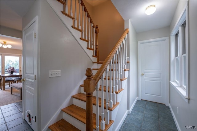 3871 Skyline Dr, Kirkland, NY 13323 - stairs featuring baseboards and tile patterned floors
