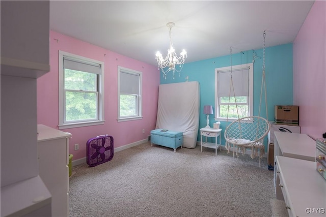 3871 Skyline Dr, Kirkland, NY 13323 - bedroom featuring a chandelier, multiple windows, carpet flooring, and baseboards