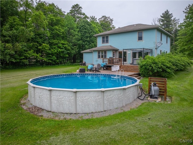 3871 Skyline Dr, Kirkland, NY 13323 - back of property with a deck, a pergola, an outdoor pool, and a yard