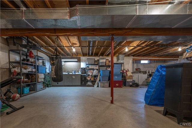 3871 Skyline Dr, Kirkland, NY 13323 - below grade area with washer and clothes dryer