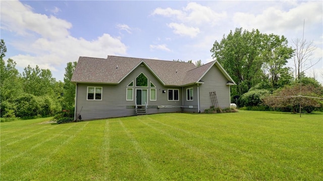 1547 Great Gully Rd, Springport, NY 13160 - rear view of property with a lawn and roof with shingles