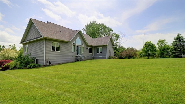 1547 Great Gully Rd, Springport, NY 13160 - rear view of house with a yard and roof with shingles