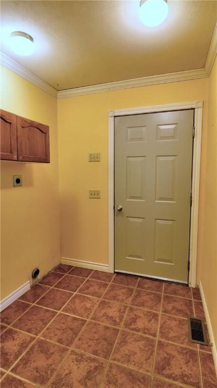 1547 Great Gully Rd, Springport, NY 13160 - laundry room with cabinet space, crown molding, hookup for an electric dryer, dark tile patterned flooring, and baseboards