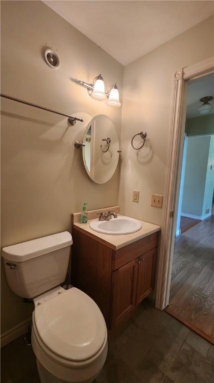 1547 Great Gully Rd, Springport, NY 13160 - bathroom with vanity and toilet