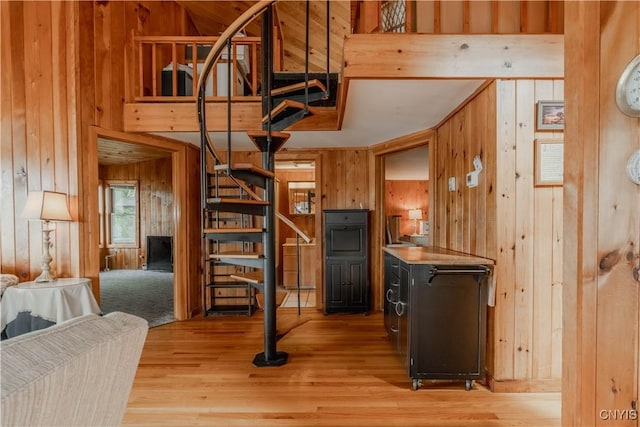 48785 Bamerick Rd, Alexandria, NY 13679 - living area with wooden walls, stairs, and light wood finished floors