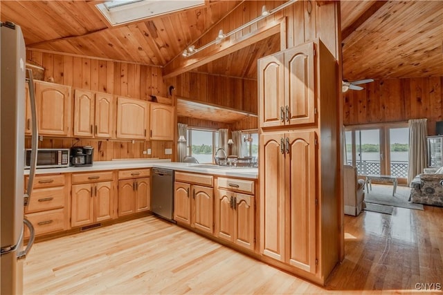 48785 Bamerick Rd, Alexandria, NY 13679 - kitchen featuring stainless steel appliances, wooden ceiling, wood walls, a sink, and plenty of natural light