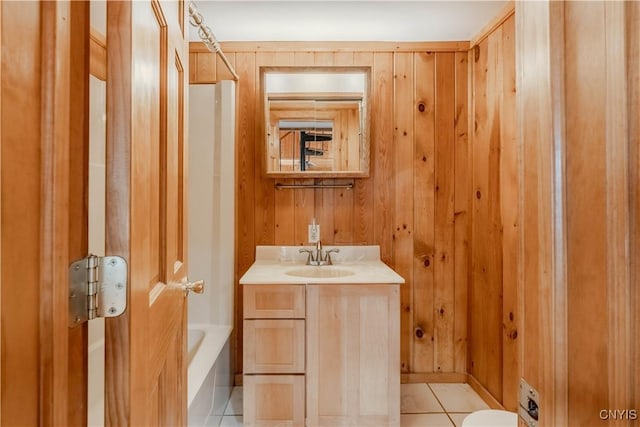 48785 Bamerick Rd, Alexandria, NY 13679 - bathroom with vanity, wood walls, tile patterned flooring, and toilet