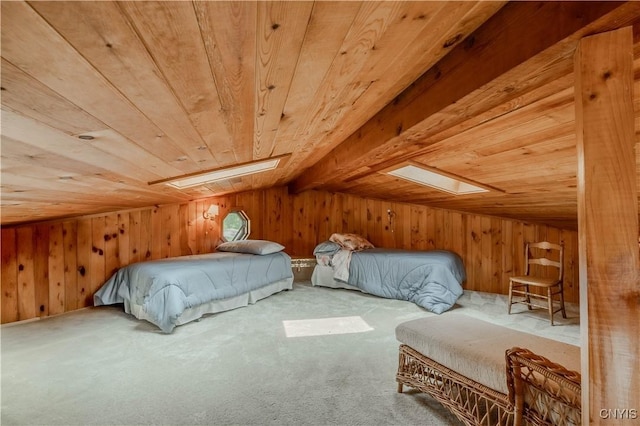 48785 Bamerick Rd, Alexandria, NY 13679 - carpeted bedroom featuring wooden ceiling, a skylight, wooden walls, and lofted ceiling