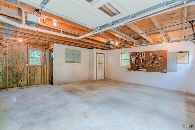48785 Bamerick Rd, Alexandria, NY 13679 - garage with a garage door opener and electric panel