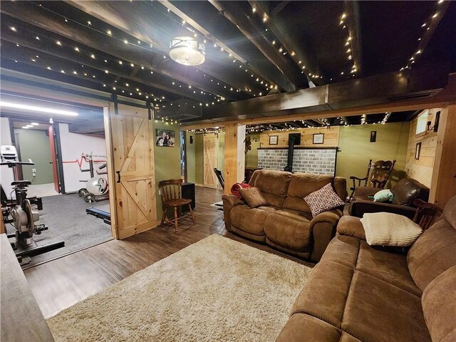1305 Wyncoop Creek Rd, Chemung, NY 14825 - living area with a barn door and wood finished floors