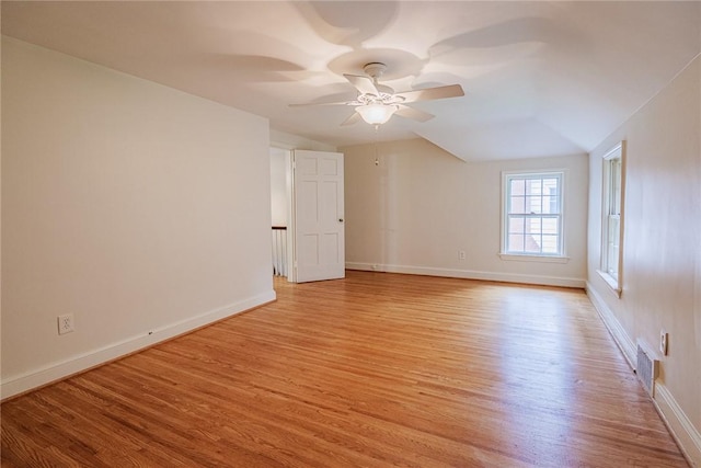68 Colonial Village Rd, Brighton, NY 14625 - unfurnished room featuring light wood-type flooring, baseboards, a ceiling fan, and lofted ceiling