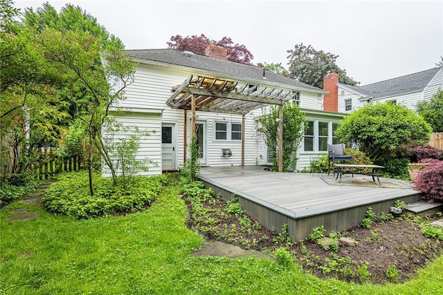 68 Colonial Village Rd, Brighton, NY 14625 - back of house with a pergola, a deck, and a chimney