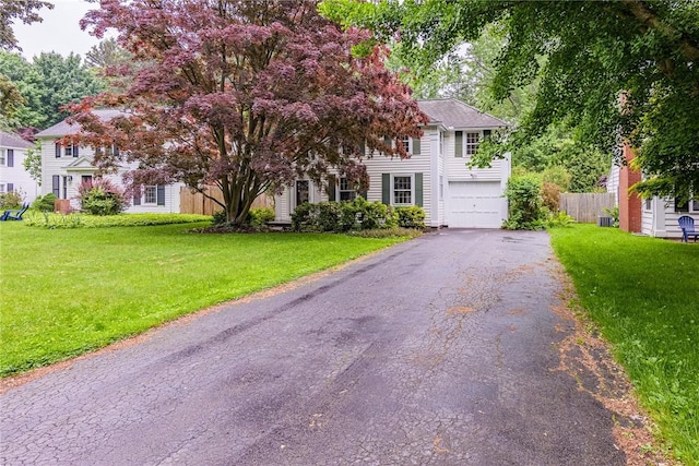68 Colonial Village Rd, Brighton, NY 14625 - colonial inspired home featuring a garage and driveway