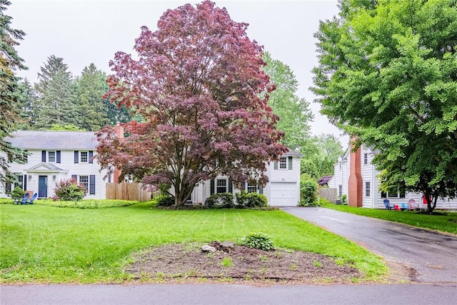 68 Colonial Village Rd, Brighton, NY 14625 - view of front of home featuring asphalt driveway and a garage