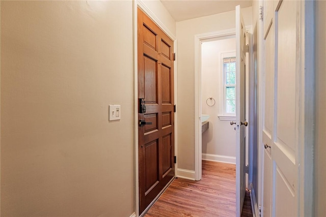 68 Colonial Village Rd, Brighton, NY 14625 - hall featuring light wood-style floors and baseboards