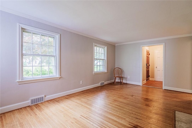 68 Colonial Village Rd, Brighton, NY 14625 - unfurnished room featuring ornamental molding, light wood-type flooring, and baseboards