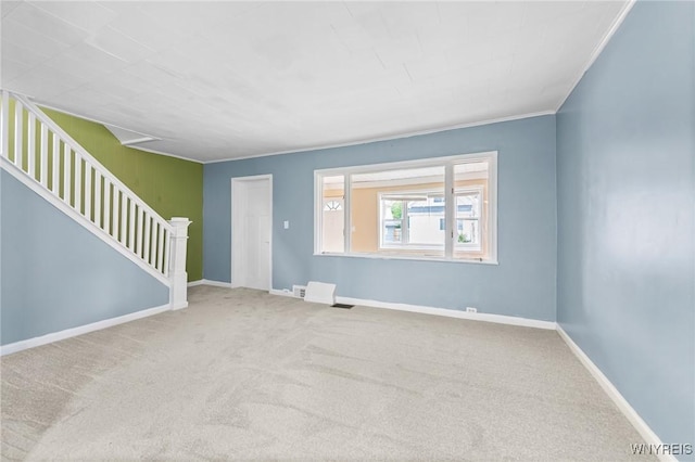103 Ledger St, Buffalo, NY 14216 - unfurnished living room with carpet flooring, baseboards, and stairs