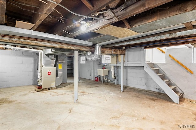 103 Ledger St, Buffalo, NY 14216 - unfinished below grade area with heating unit, stairway, and a sink