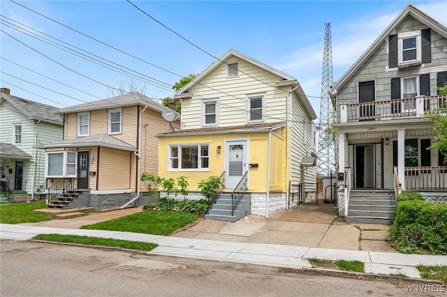 103 Ledger St, Buffalo, NY 14216 - traditional style home with entry steps, a balcony, and a porch