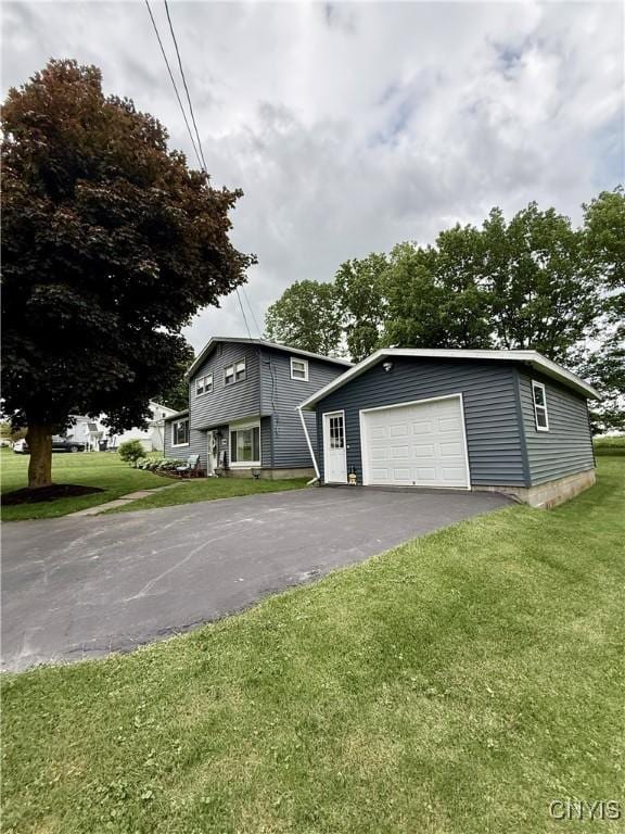 2718 Forest Hill Dr, Fleming, NY 13021 - view of front of house featuring an outbuilding, asphalt driveway, and a front yard