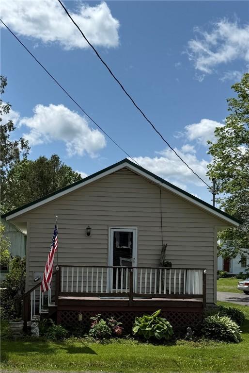 3679 County Highway 35, Middlefield, NY 13450 - rear view of property featuring a deck