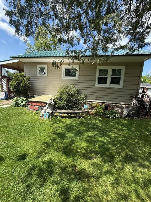 3679 County Highway 35, Middlefield, NY 13450 - back of property featuring a yard