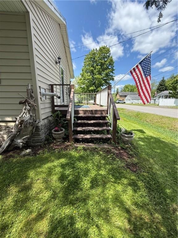3679 County Highway 35, Middlefield, NY 13450 - view of green lawn featuring a wooden deck
