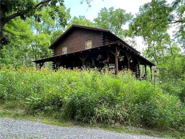 3921 State Route 226, Tyrone, NY 14837 - view of side of property with log exterior