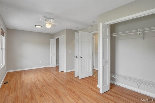 836 Upper Mountain Rd, Lewiston, NY 14092 - unfurnished bedroom with light wood finished floors, baseboards, and a ceiling fan
