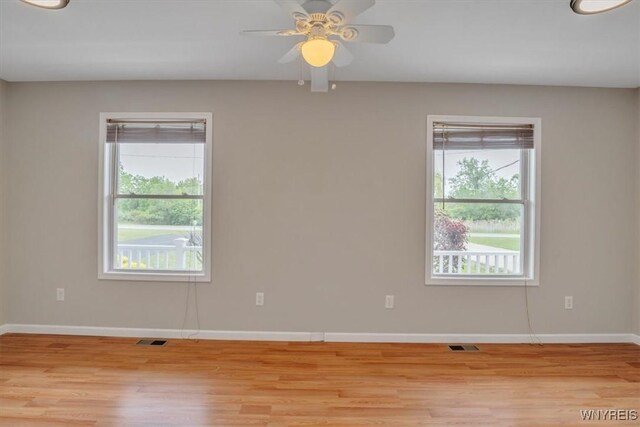 836 Upper Mountain Rd, Lewiston, NY 14092 - unfurnished room with baseboards, light wood-style flooring, and ceiling fan