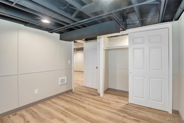 836 Upper Mountain Rd, Lewiston, NY 14092 - unfurnished bedroom featuring light wood finished floors and a closet