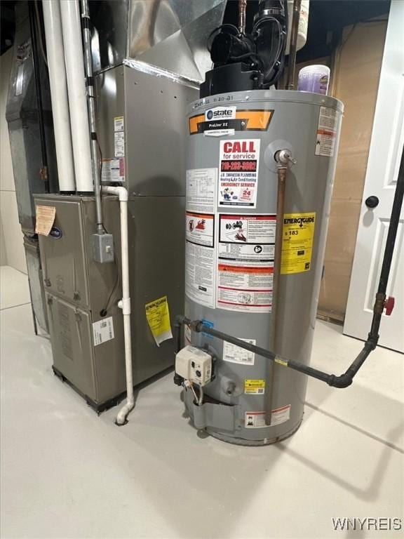 836 Upper Mountain Rd, Lewiston, NY 14092 - utility room featuring water heater and heating unit