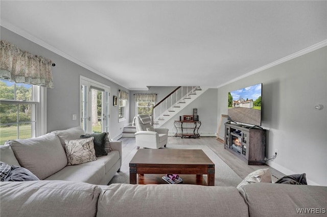 2194 Rte 39, Sheridan, NY 14062 - living area featuring stairs, plenty of natural light, ornamental molding, light wood-style flooring, and baseboards