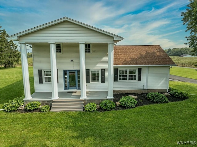 2194 Rte 39, Sheridan, NY 14062 - back of house with a porch, a yard, and roof with shingles