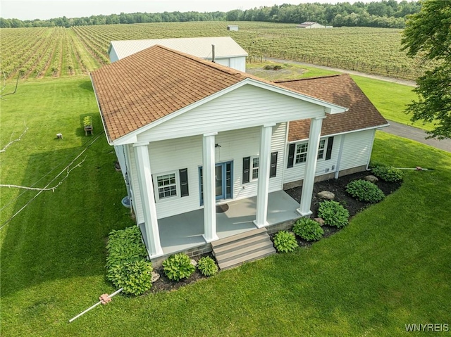 2194 Rte 39, Sheridan, NY 14062 - view of front of home with agricultural area, a porch, a view of rural / pastoral area, and a shingled roof