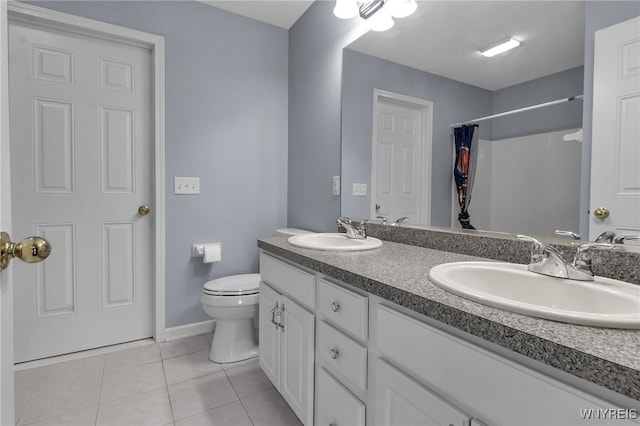 6017 Corinne Ln, Clarence, NY 14032 - bathroom with tile patterned floors, toilet, double vanity, baseboards, and curtained shower
