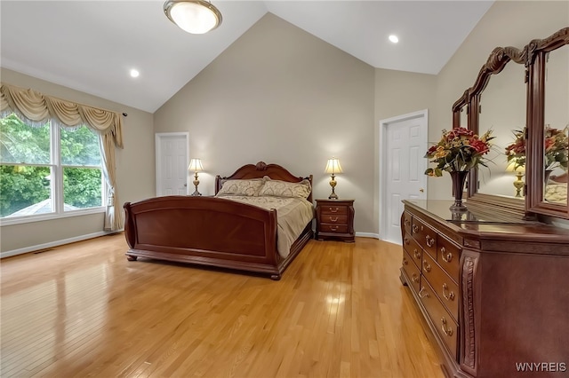 6017 Corinne Ln, Clarence, NY 14032 - bedroom with high vaulted ceiling, light wood-style flooring, baseboards, and recessed lighting