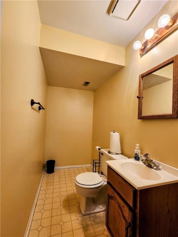 508 Countess Dr, Henrietta, NY 14586 - half bath with toilet, vanity, and baseboards