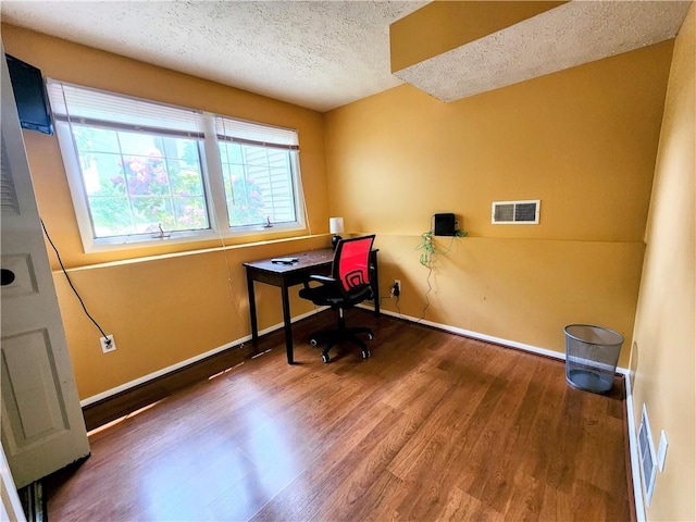 508 Countess Dr, Henrietta, NY 14586 - home office with wood finished floors, a textured ceiling, and baseboards